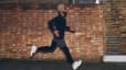 Peloton member running outdoors