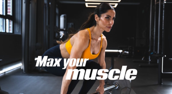 Coach Assal Arian squatting with a barbell reading max your muscle