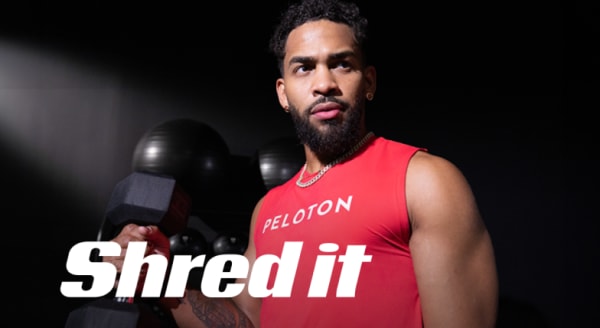 Coach Rad Lopez lifting a weight Shred It