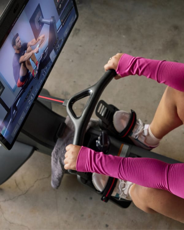 Peloton row stowed against a wall